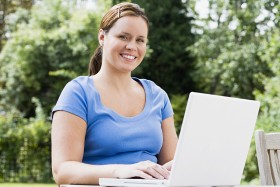 Woman shopping online with her laptop